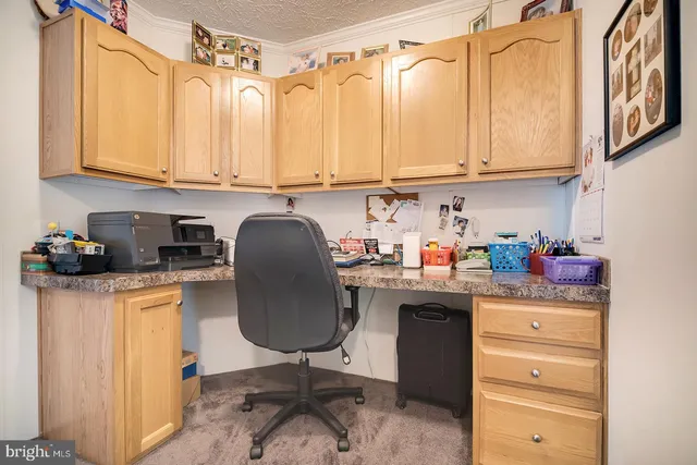 a bedroom with bed and a flat screen tv