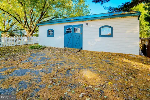 a view of yard with swimming pool