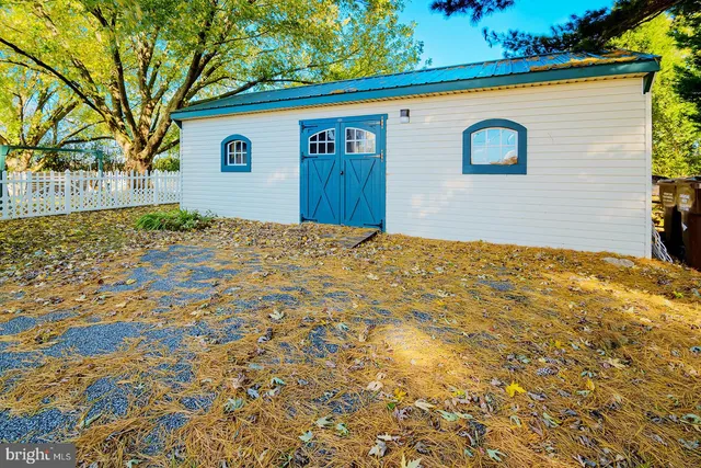a view of yard with swimming pool