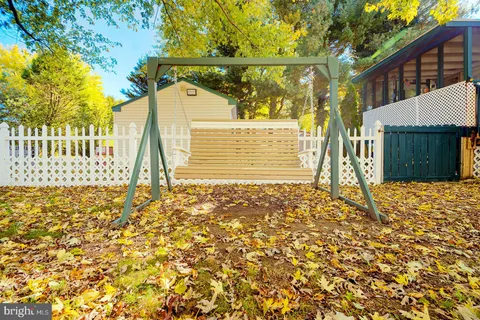 a view of yard along with trees