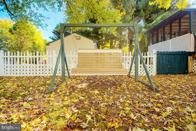 a view of yard along with trees