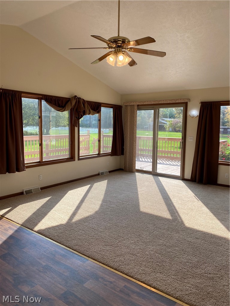 7682 Sanborn Road Ashtabula, OH 44004 - Photo 5 of 35 Vaulted year round sunroom with loads of windows, area for a hot tub and a full shower. Beautiful views. Leads out to the rear deck and side patio.