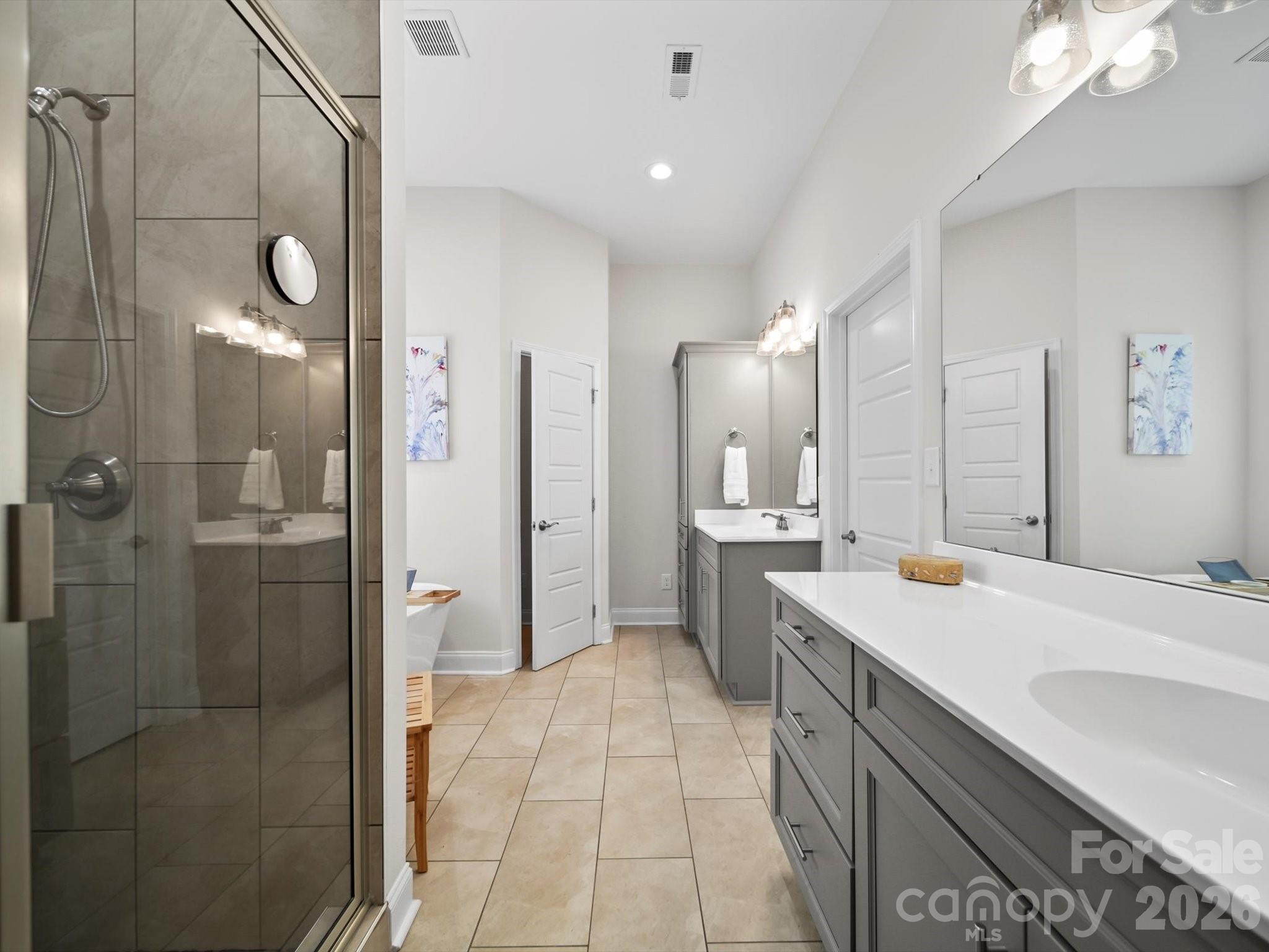 1421 Hamilton Crossroads Road Marshville, NC 28103 - Photo 13 of 29 a kitchen with a sink a refrigerator and a counter top space