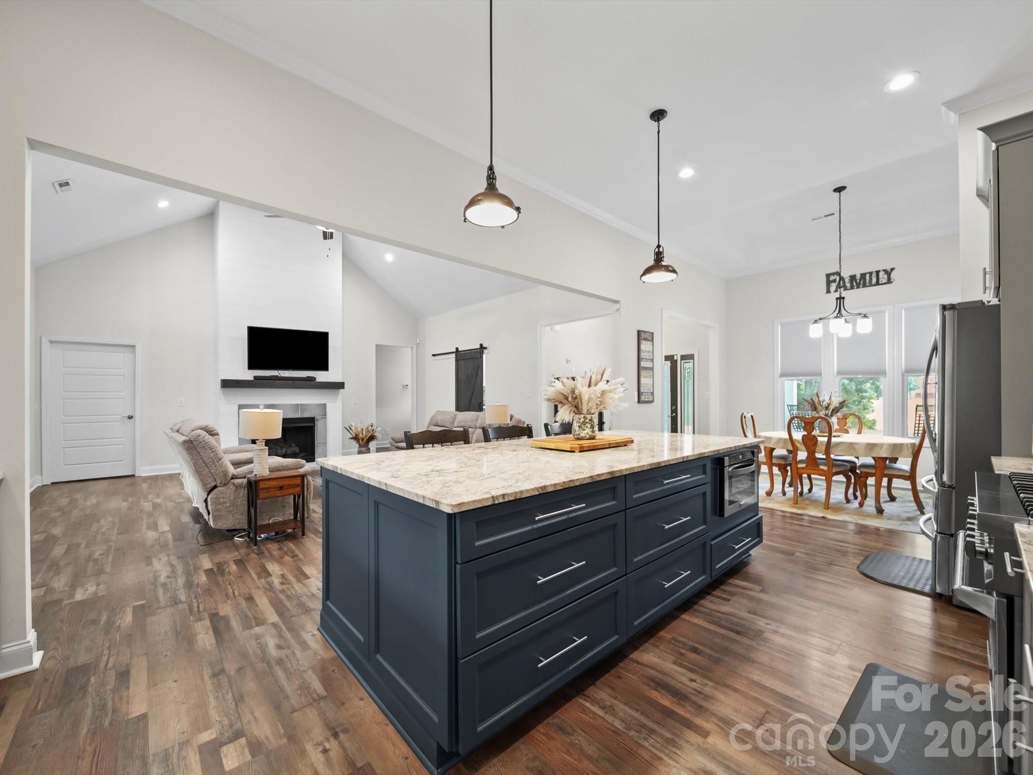 1421 Hamilton Crossroads Road Marshville, NC 28103 - Photo 6 of 29 a kitchen with stainless steel appliances granite countertop a stove and refrigerator