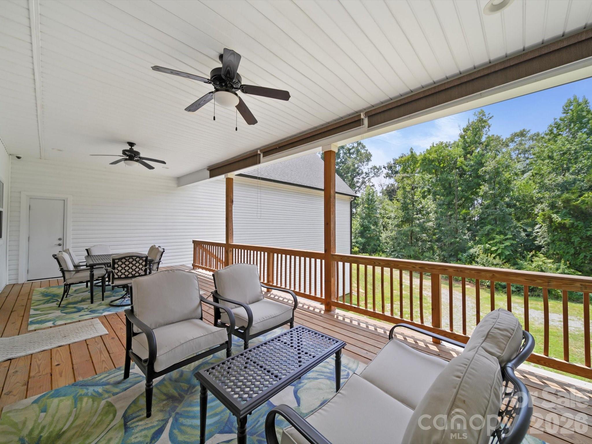 1421 Hamilton Crossroads Road Marshville, NC 28103 - Photo 10 of 29 a roof deck with a table and chairs