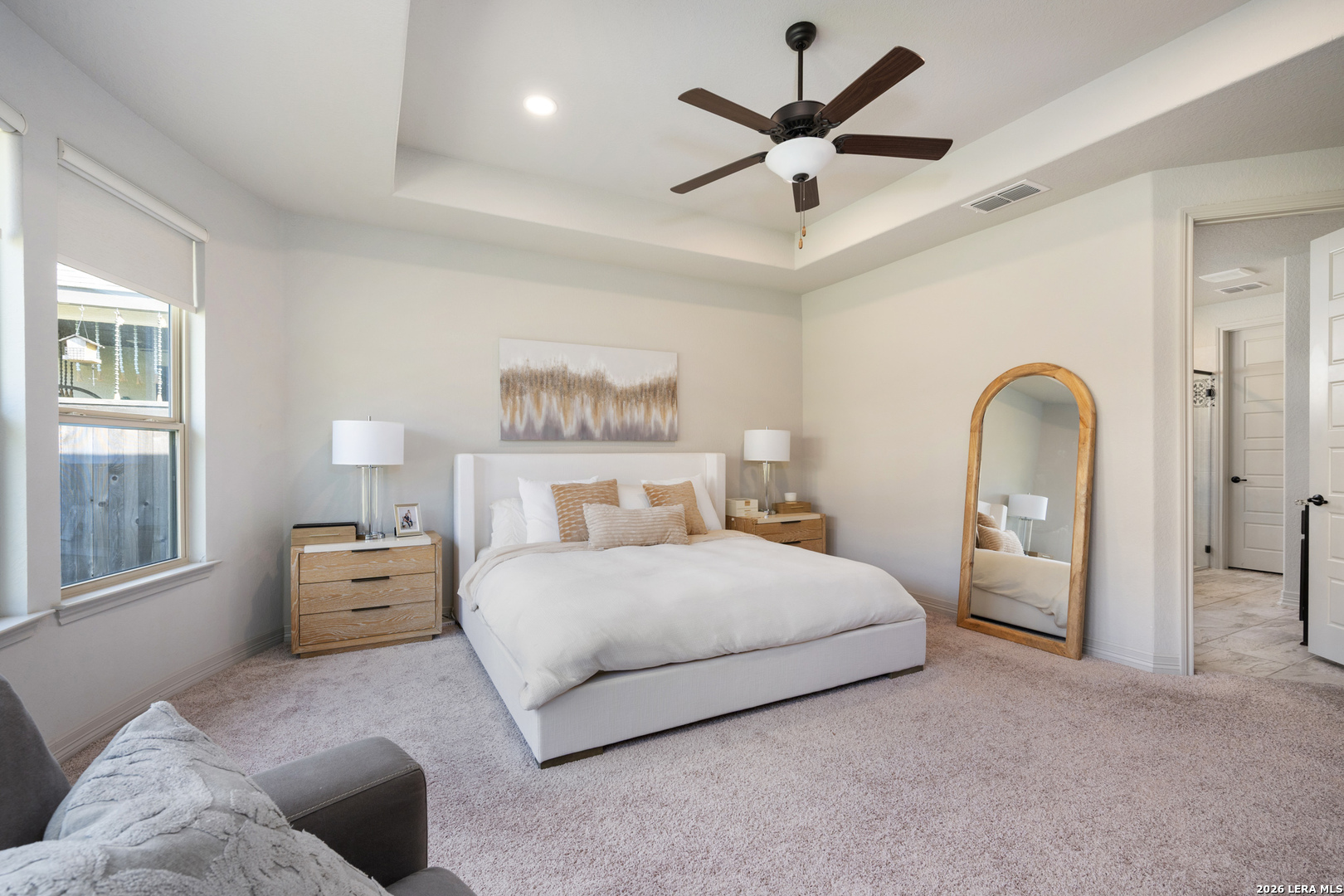 8527 Nichols Rim Boerne, TX 78015 - Photo 19 of 33 a bedroom with a bed and a large window