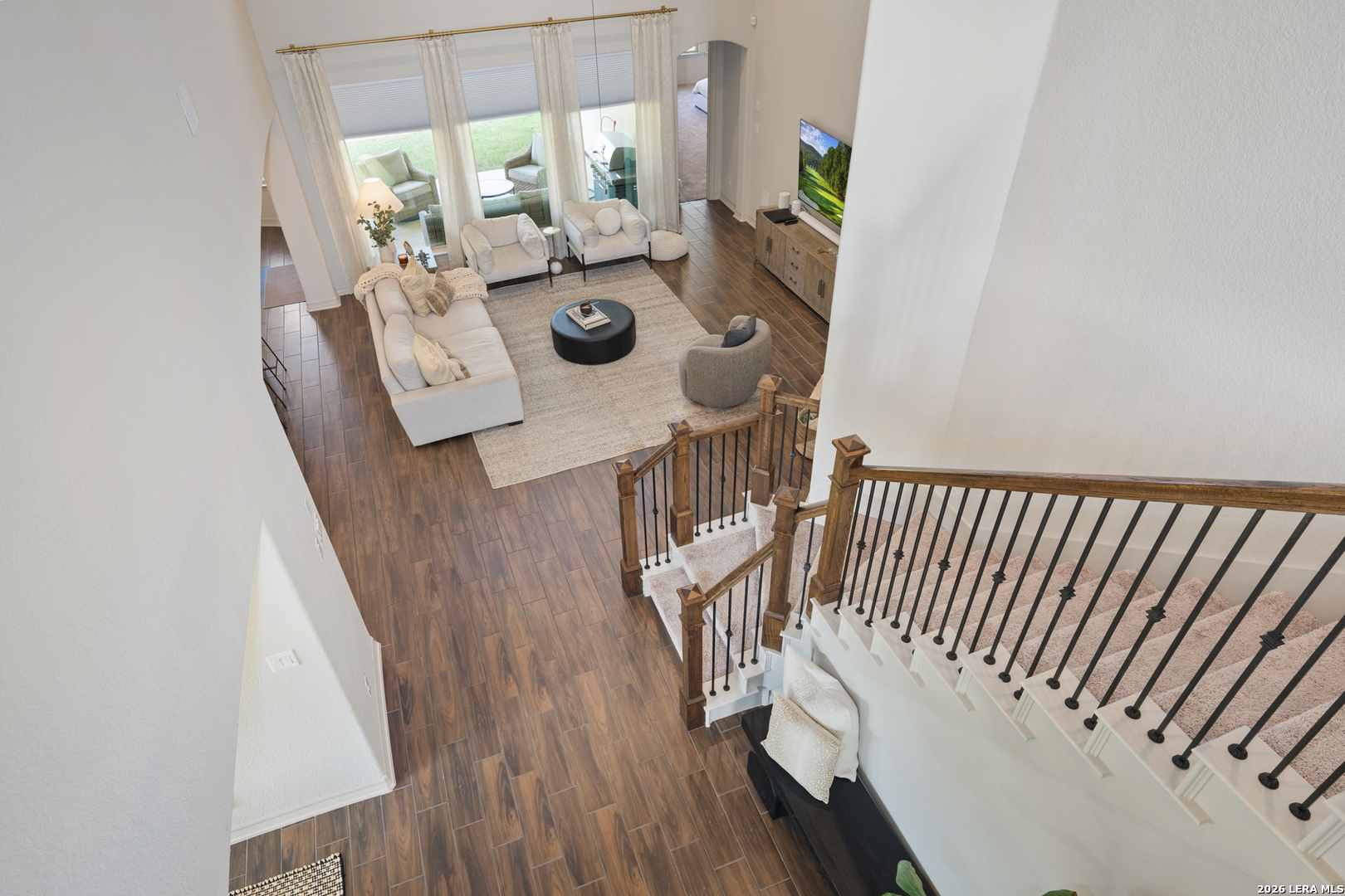8527 Nichols Rim Boerne, TX 78015 - Photo 23 of 33 a view of a dining room with furniture and wooden floor