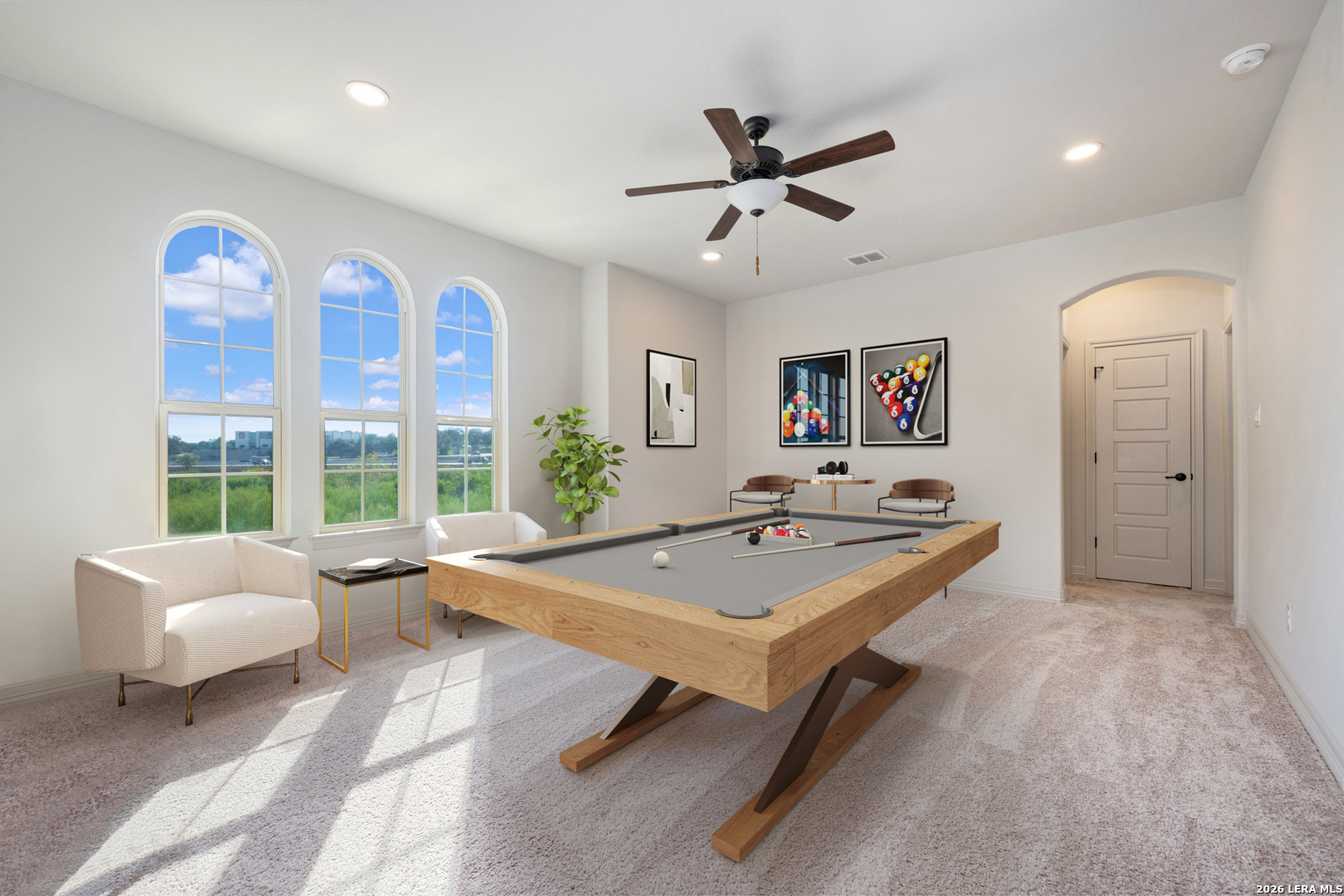 8527 Nichols Rim Boerne, TX 78015 - Photo 26 of 33 a living room with furniture and a large window