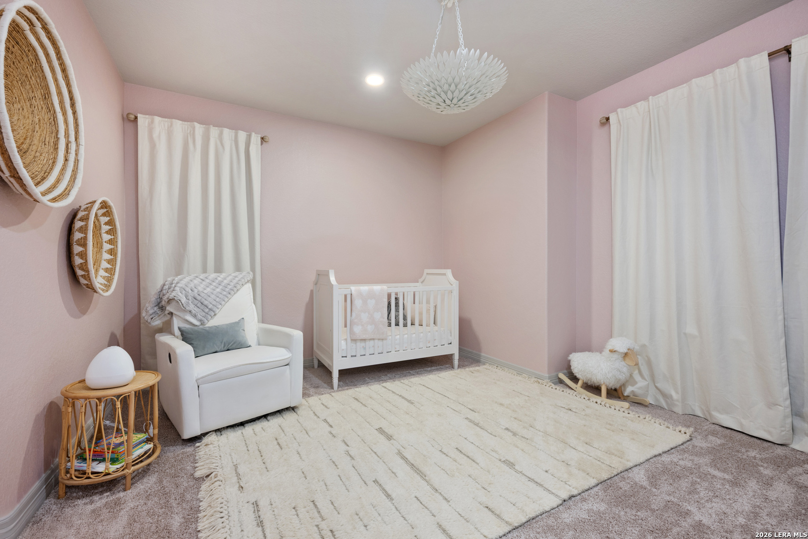 8527 Nichols Rim Boerne, TX 78015 - Photo 27 of 33 a bedroom with a bed and a couch