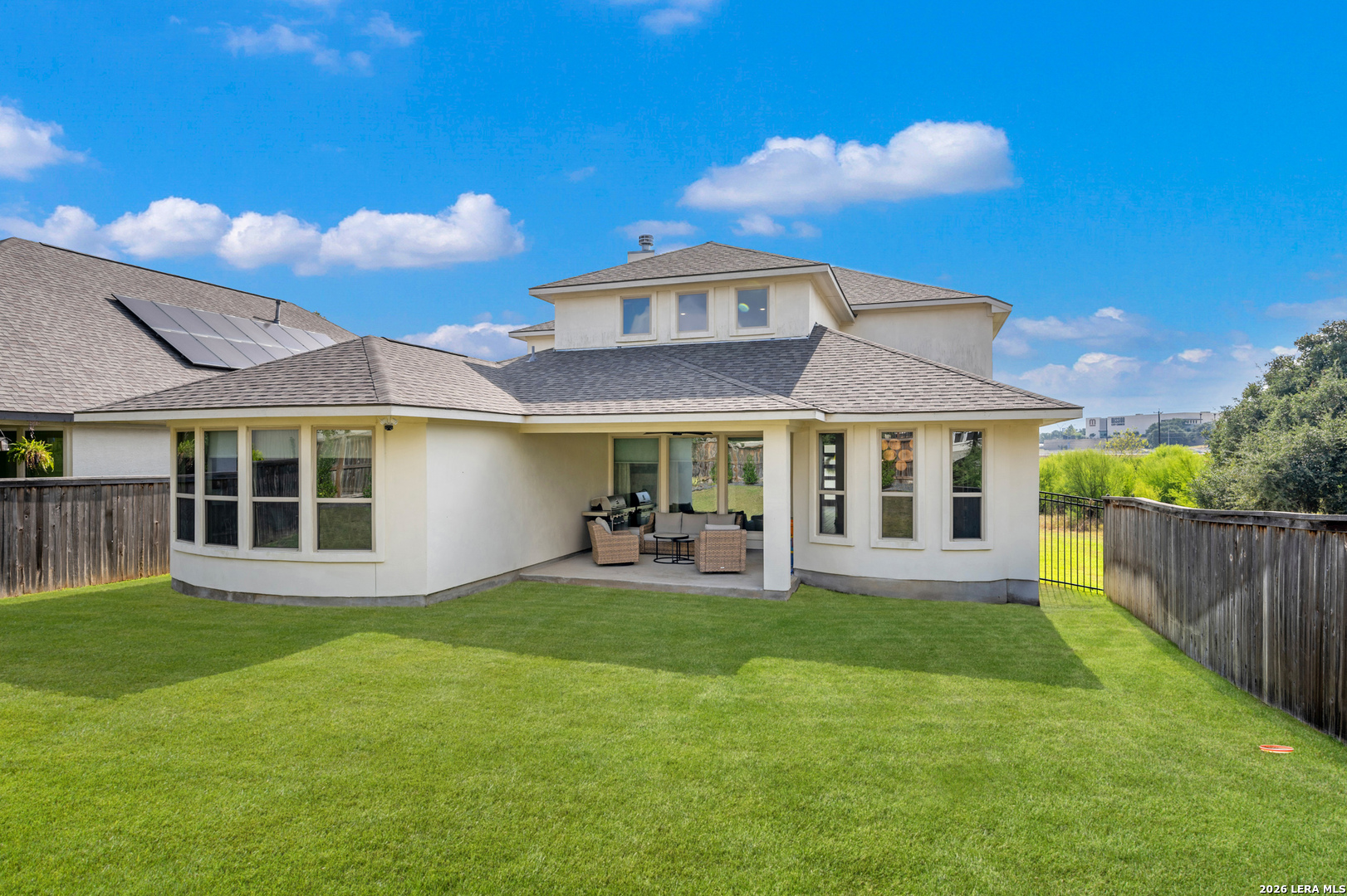8527 Nichols Rim Boerne, TX 78015 - Photo 32 of 33 a view of a house with a yard and sitting area