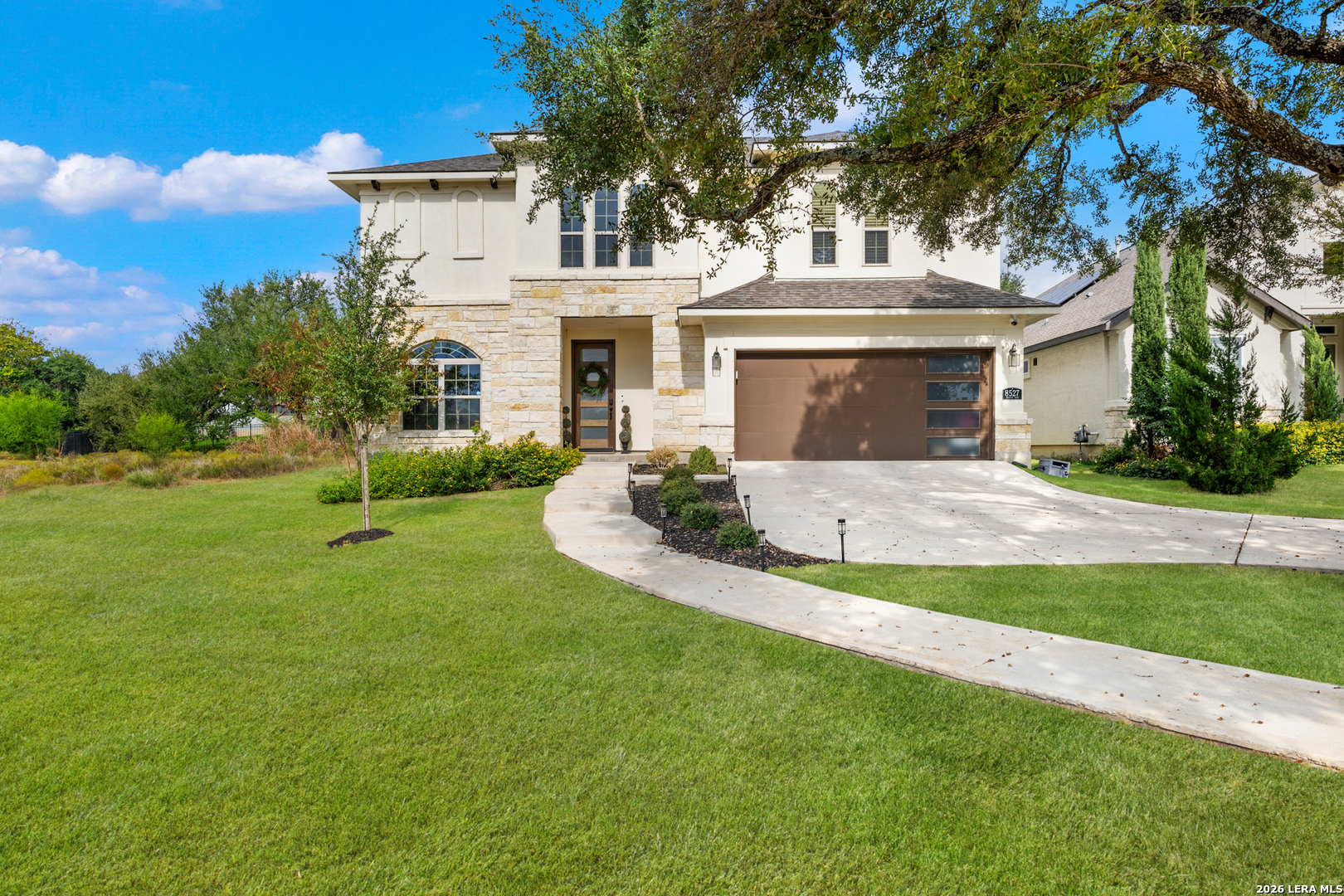8527 Nichols Rim Boerne, TX 78015 - Photo 4 of 33 a view of house with a big yard and potted plants