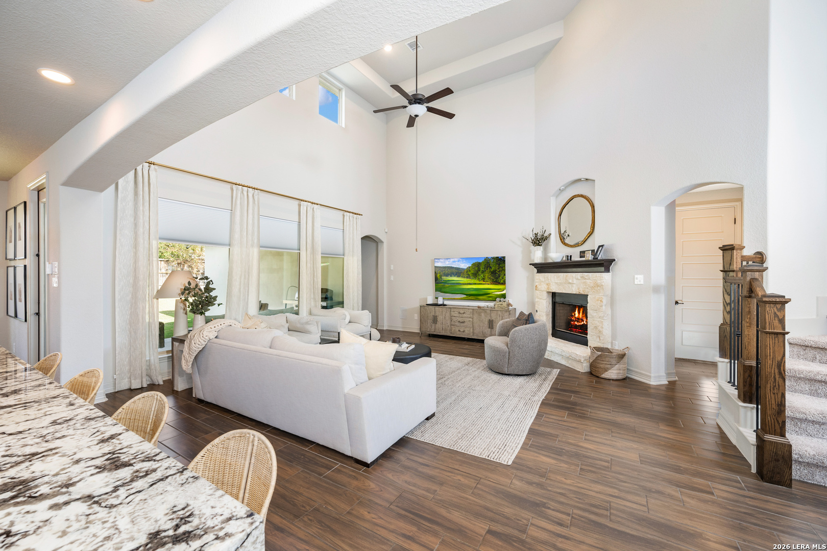 8527 Nichols Rim Boerne, TX 78015 - Photo 8 of 33 a bedroom with furniture and a fireplace