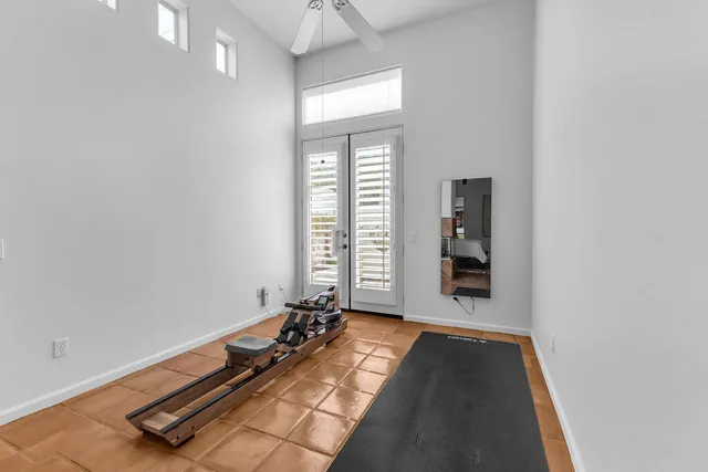 a view of storage and utility room with windows
