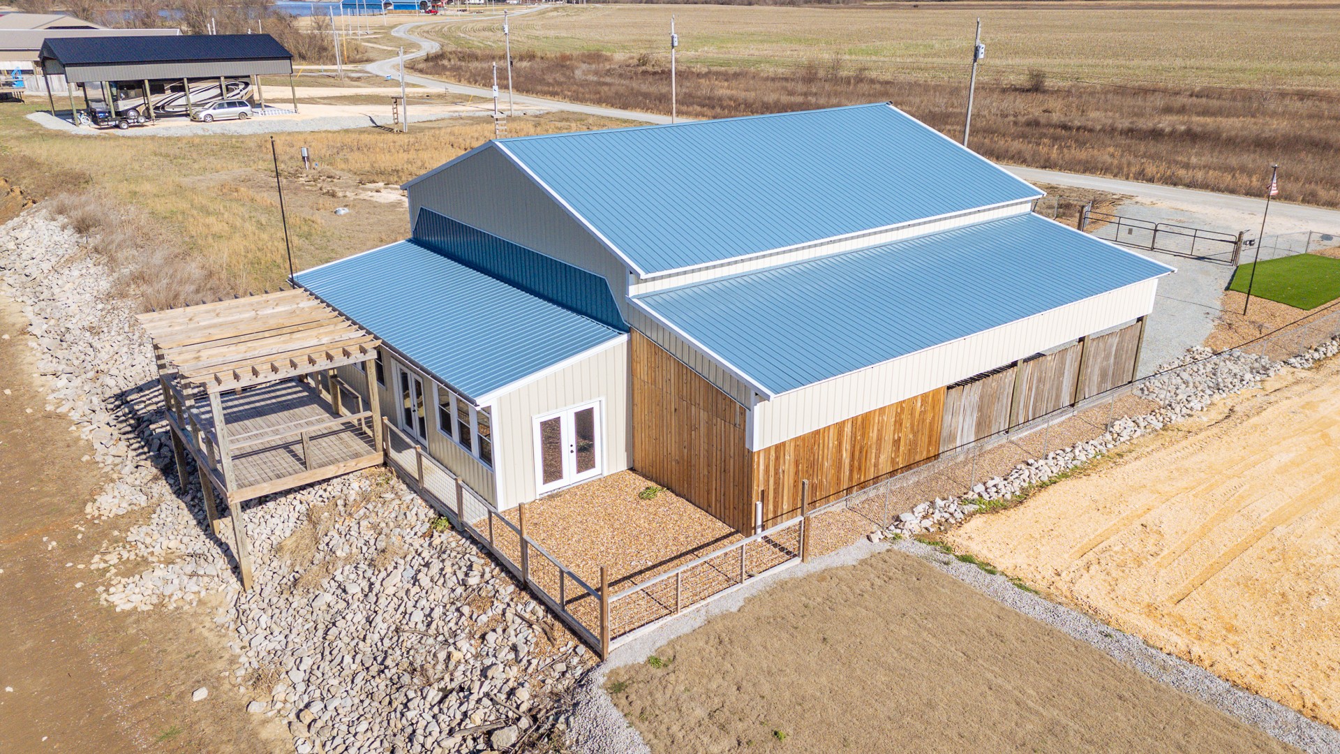 2217 Hardin Bottom River Road Clifton, TN 38425 - Photo 2 of 66 a aerial view of a house with a swimming pool