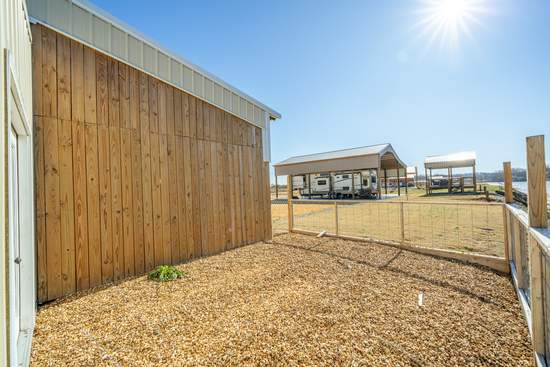 2217 Hardin Bottom River Road Clifton, TN 38425 - Photo 21 of 66 a view of backyard with wooden fence
