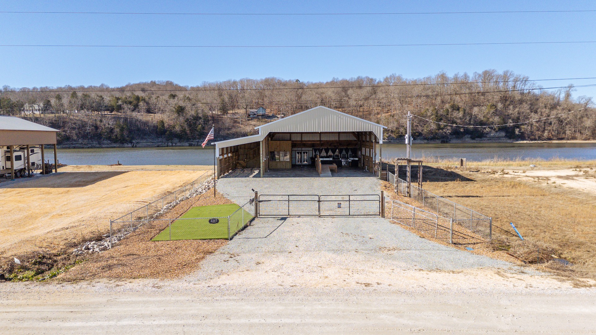2217 Hardin Bottom River Road Clifton, TN 38425 - Photo 49 of 66 a view of a swimming pool with a patio