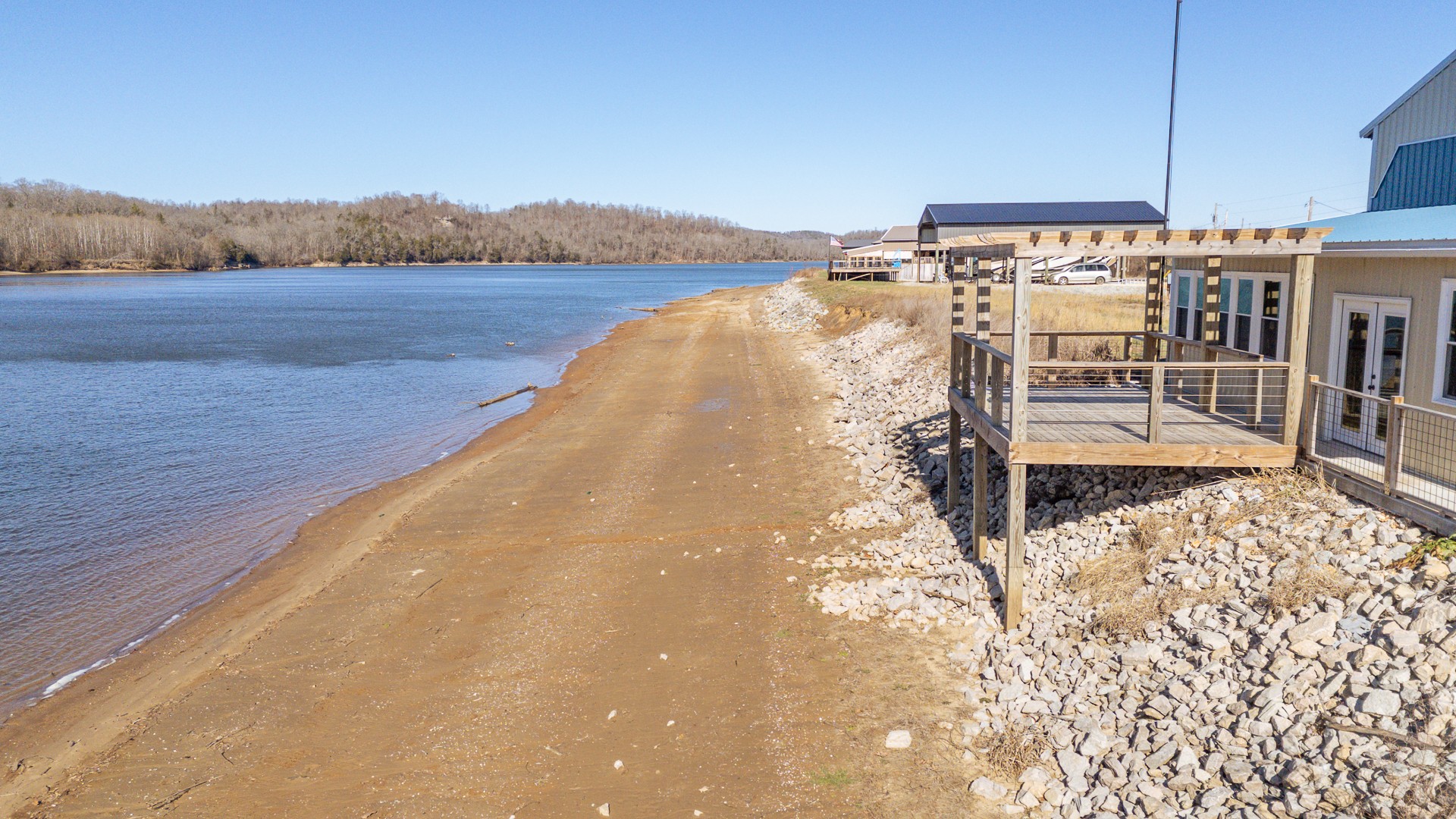 2217 Hardin Bottom River Road Clifton, TN 38425 - Photo 52 of 66 a view of a swimming pool with an ocean view