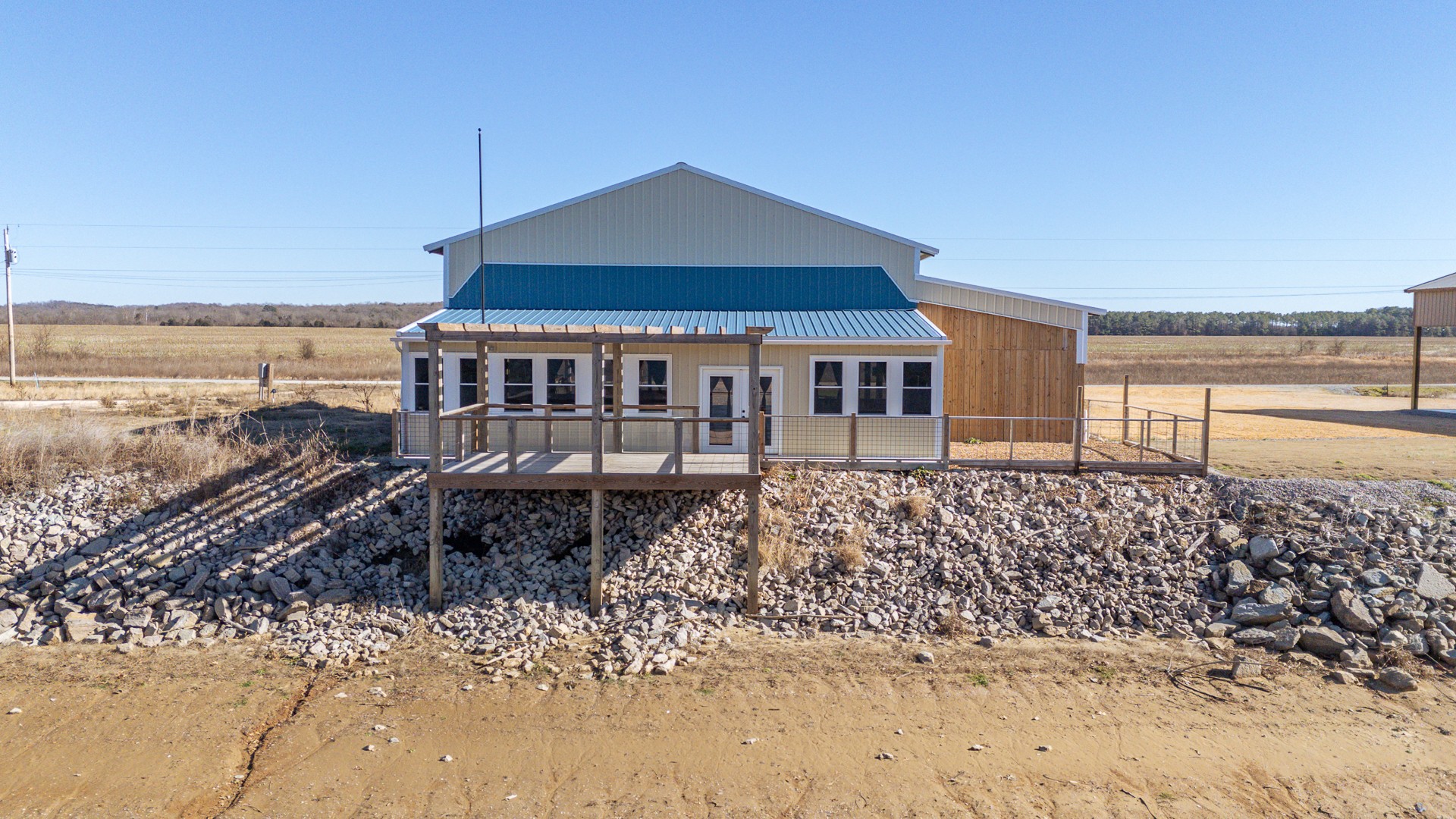 2217 Hardin Bottom River Road Clifton, TN 38425 - Photo 6 of 66 a front view of a house with a yard