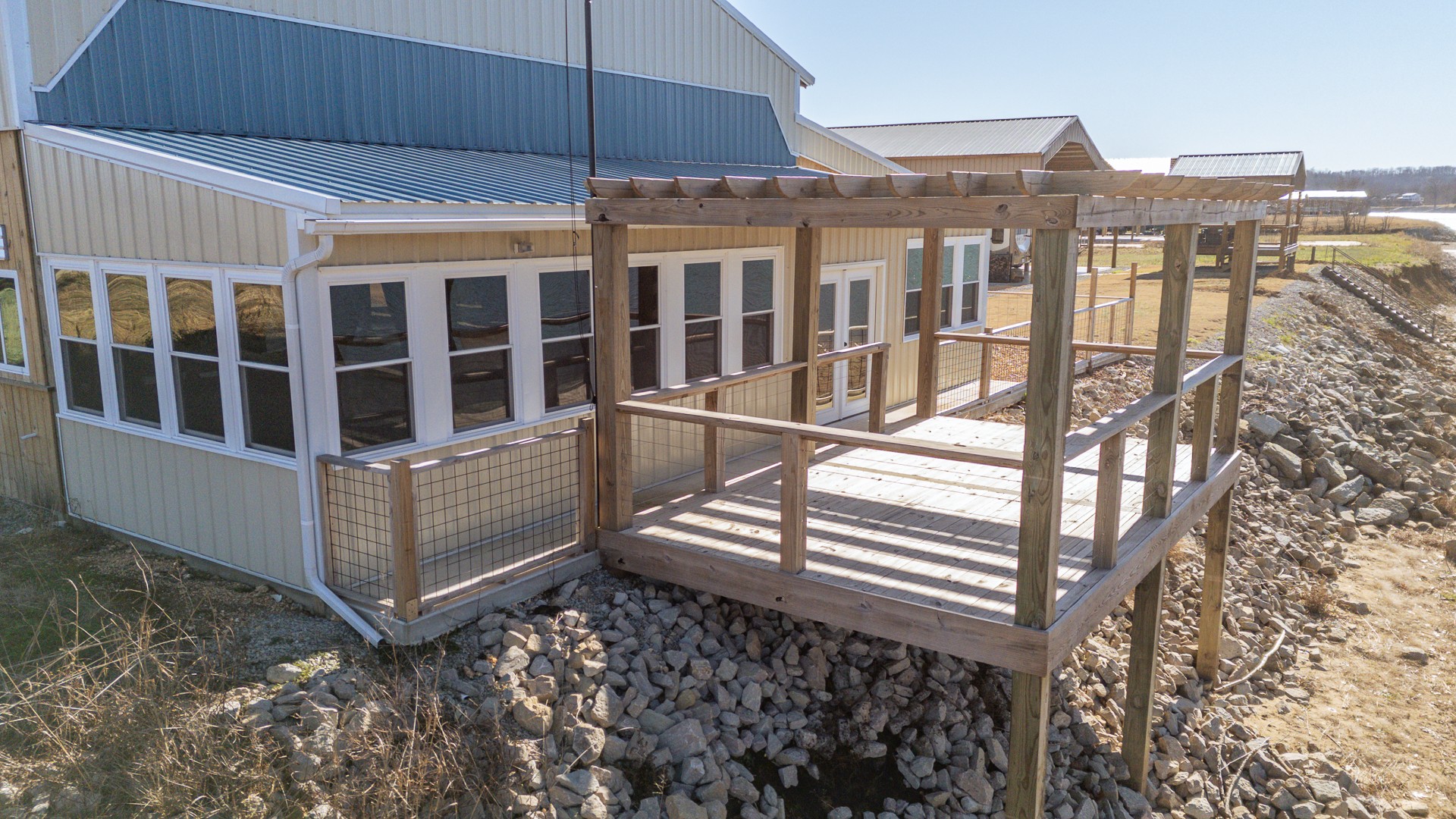 2217 Hardin Bottom River Road Clifton, TN 38425 - Photo 10 of 66 a view of a house with a small deck