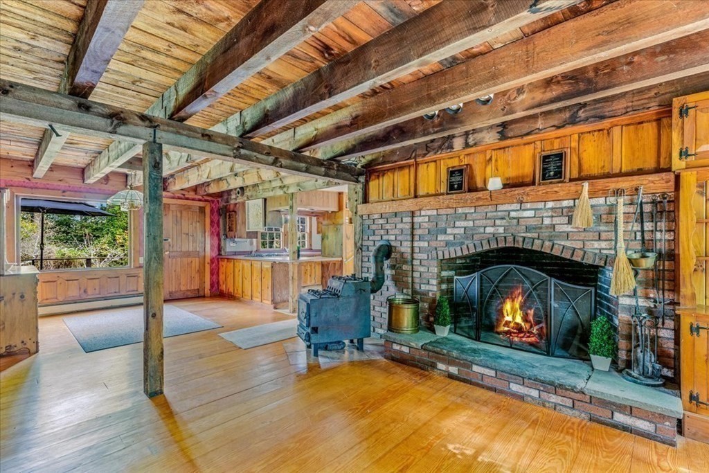 1 Robbins Path Carver, MA 02330 - Photo 12 of 42 a living room with furniture and a fireplace