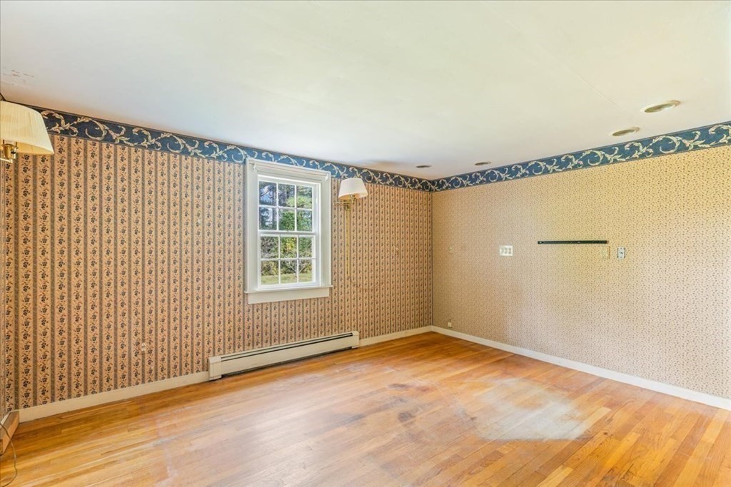 1 Robbins Path Carver, MA 02330 - Photo 15 of 42 a view of an empty room with a window