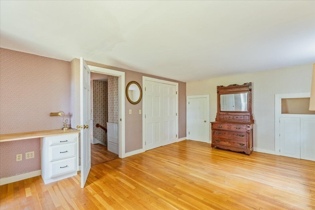 1 Robbins Path Carver, MA 02330 - Photo 16 of 42 a bedroom with a bed and a dresser