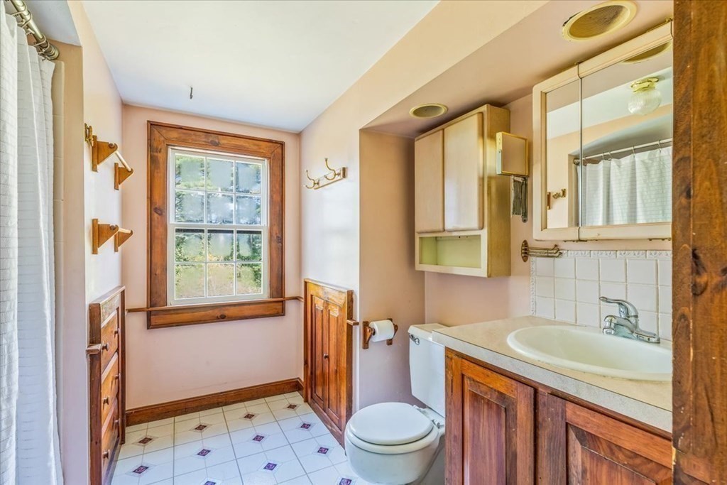 1 Robbins Path Carver, MA 02330 - Photo 18 of 42 a bathroom with a granite countertop sink toilet and shower