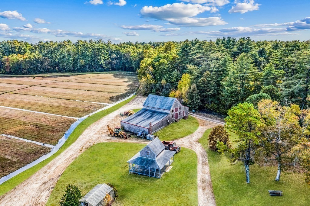1 Robbins Path Carver, MA 02330 - Photo 24 of 42 a view of a swimming pool with a yard
