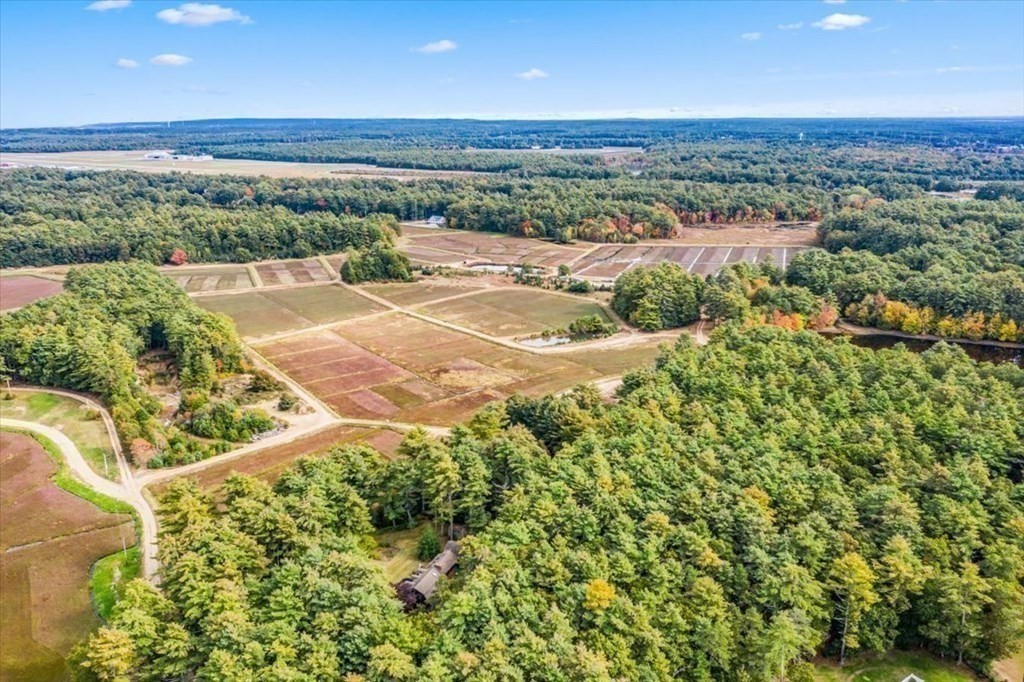 1 Robbins Path Carver, MA 02330 - Photo 33 of 42 an aerial view of a house with a yard and lake view