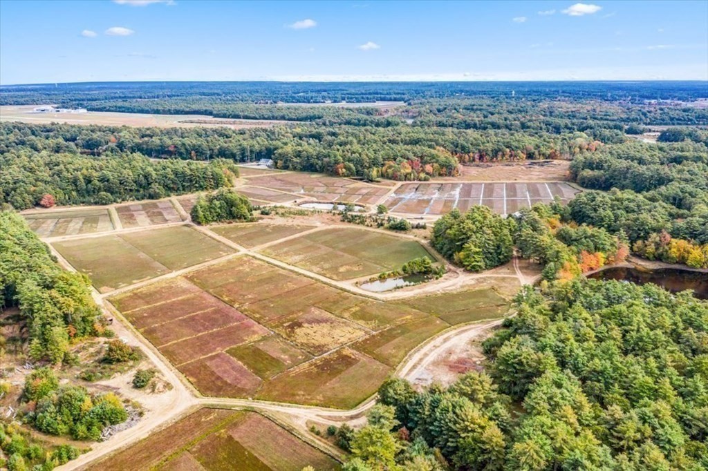 1 Robbins Path Carver, MA 02330 - Photo 34 of 42 an aerial view of residential houses with outdoor space