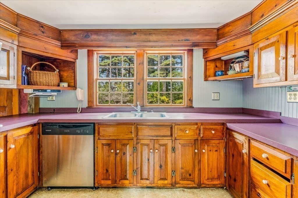 1 Robbins Path Carver, MA 02330 - Photo 7 of 42 a view of a kitchen with a sink and a window