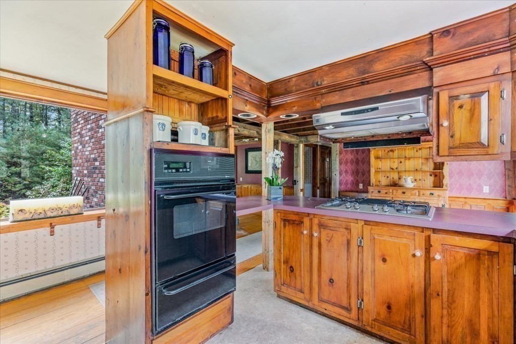 1 Robbins Path Carver, MA 02330 - Photo 9 of 42 a kitchen with stainless steel appliances granite countertop a refrigerator and a stove