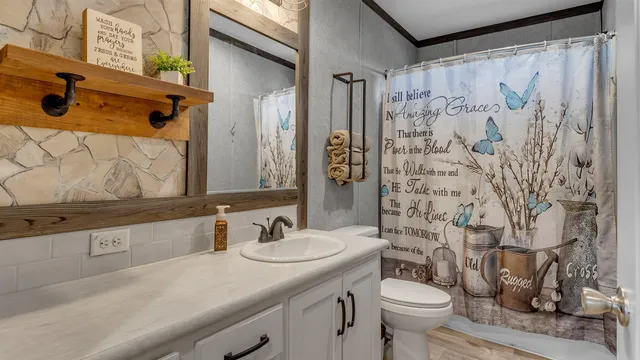 a bathroom with a sink and a toilet