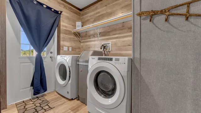 a utility room with dryer and washer