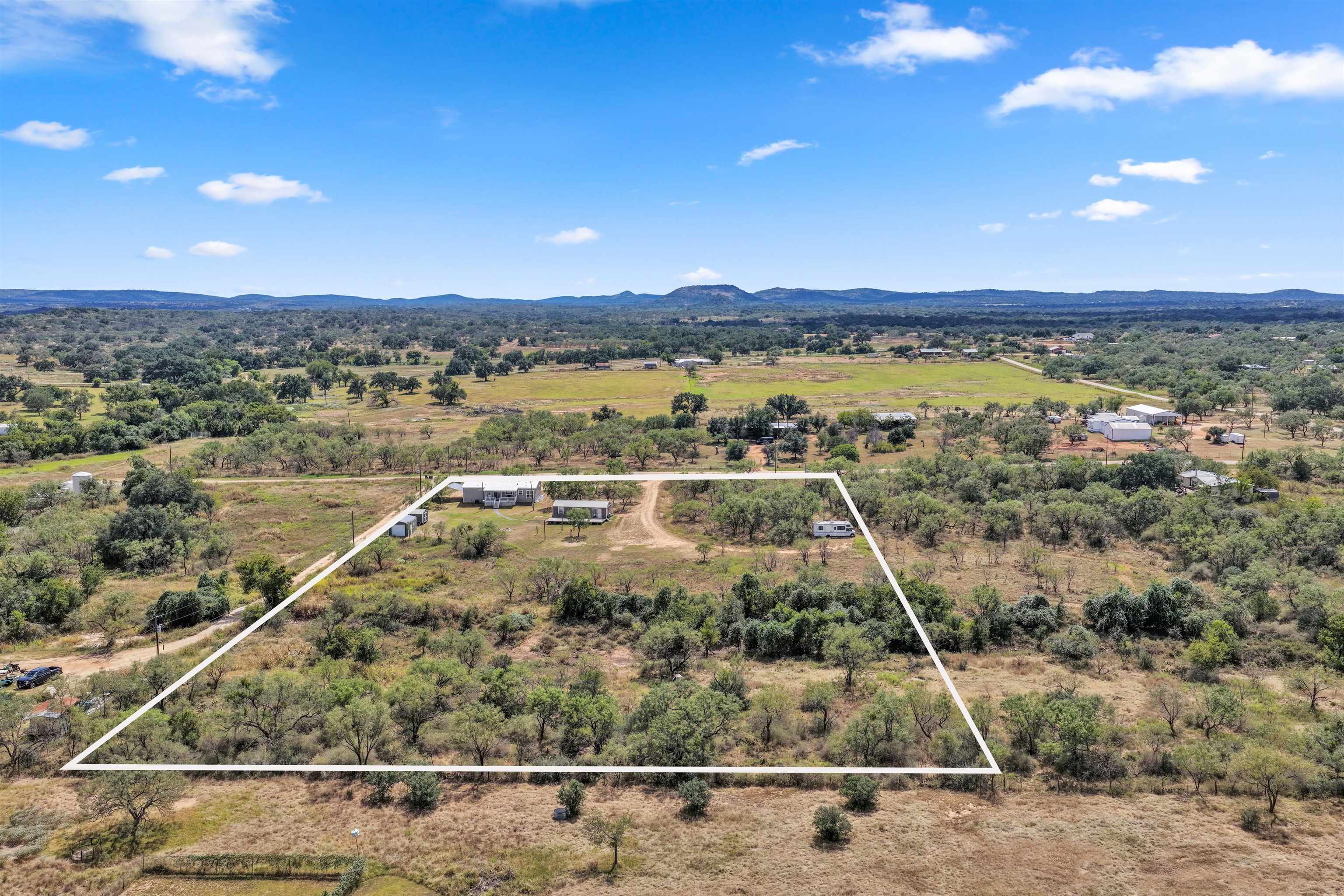 321 Flag Creek Ranch Circle Llano, TX 78643 - Photo 30 of 30 a view of a swimming pool and lake view
