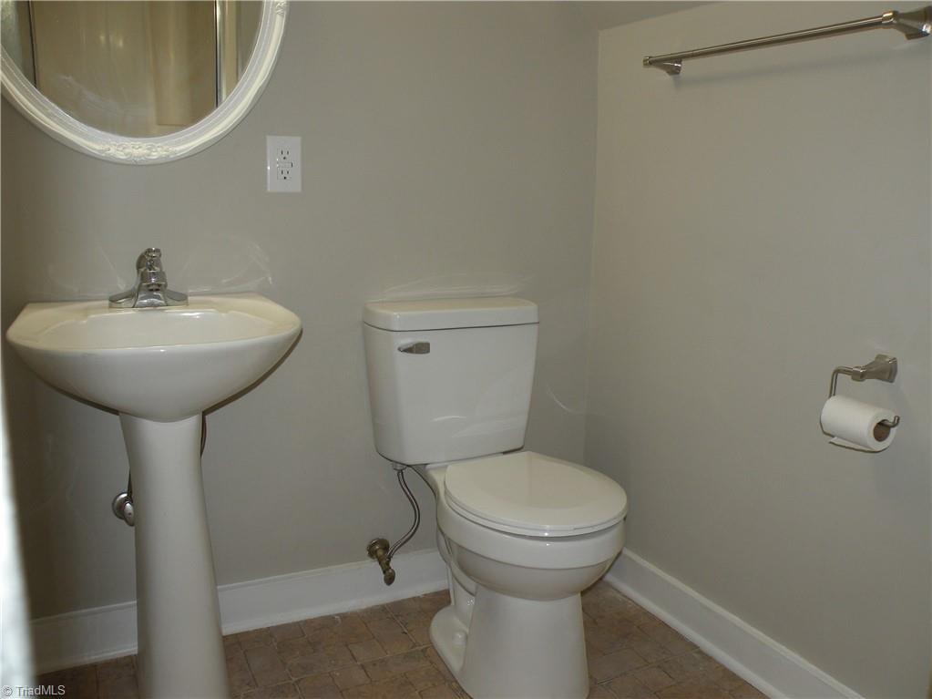 4723 Kirk Road Winston-Salem, NC 27103 - Photo 14 of 22 Primary Bath - pedestal sink, walk-in shower and new toilet
