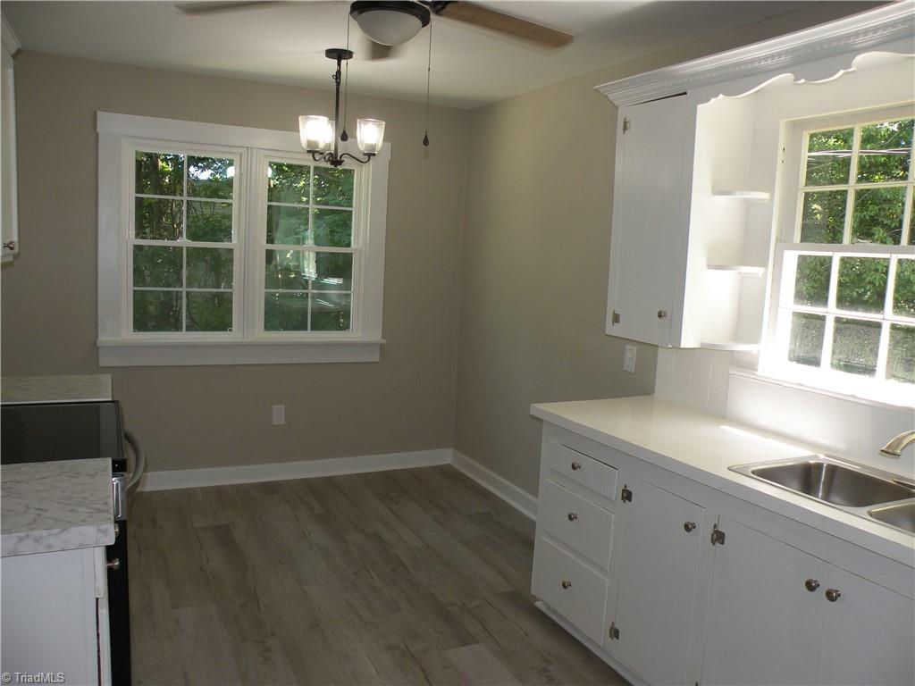 Eat-in Kitchen - Smooth Ceilings and new light fixture and ceiling fan
