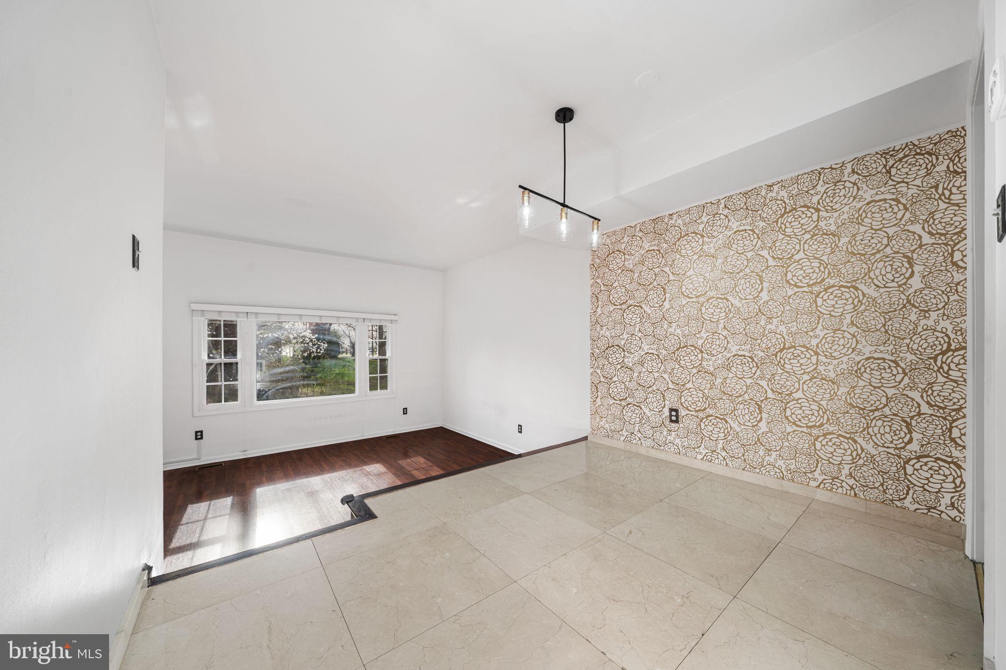 5845 Rexford Drive, Unit 721 Springfield, VA 22152 - Photo 32 of 32 a view of an empty room with windows