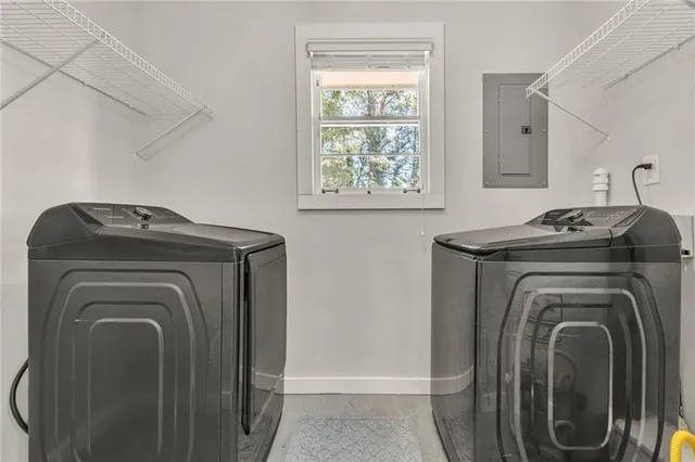 a utility room with dryer and washer
