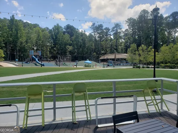 a view of a golf course with a swimming pool