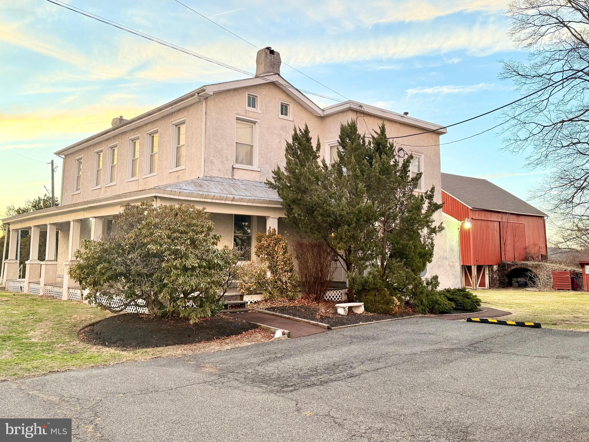 2933 West High Street Pottstown, PA 19464 - Photo 1 of 15 a front view of a house with a yard