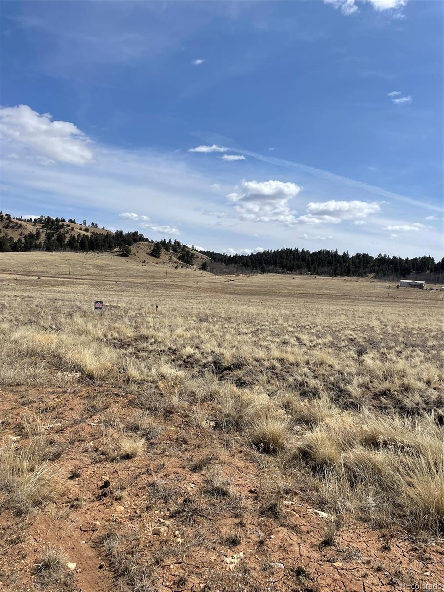 Guipago Trail Hartsel, CO 80449 - Photo 7 of 11 a view of an ocean and sunset