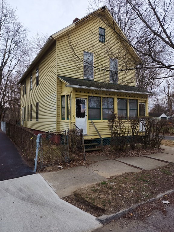 115 Greene Street Springfield, MA 01109 - Photo 4 of 4 a front view of a house with patio
