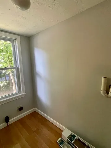 a view of a room with a window