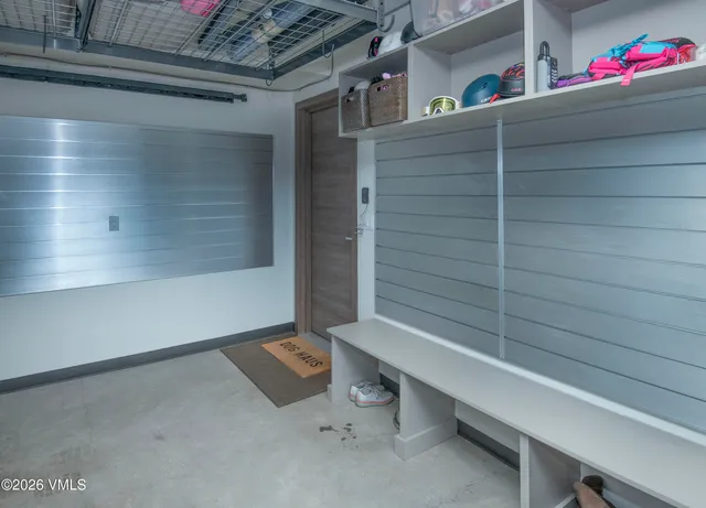 a view of a balcony with wooden floor and city view