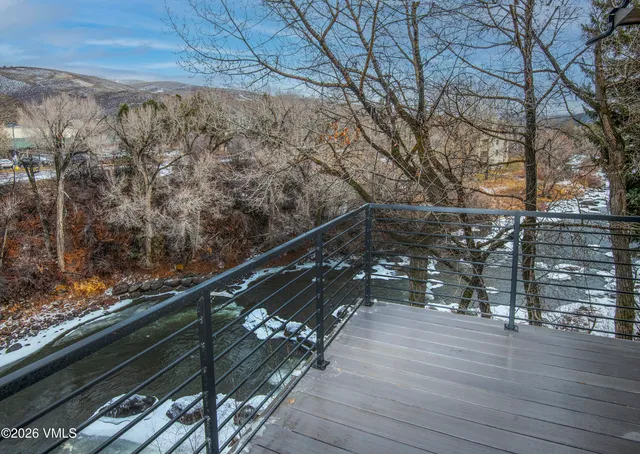a view of a chairs setting on the roof deck