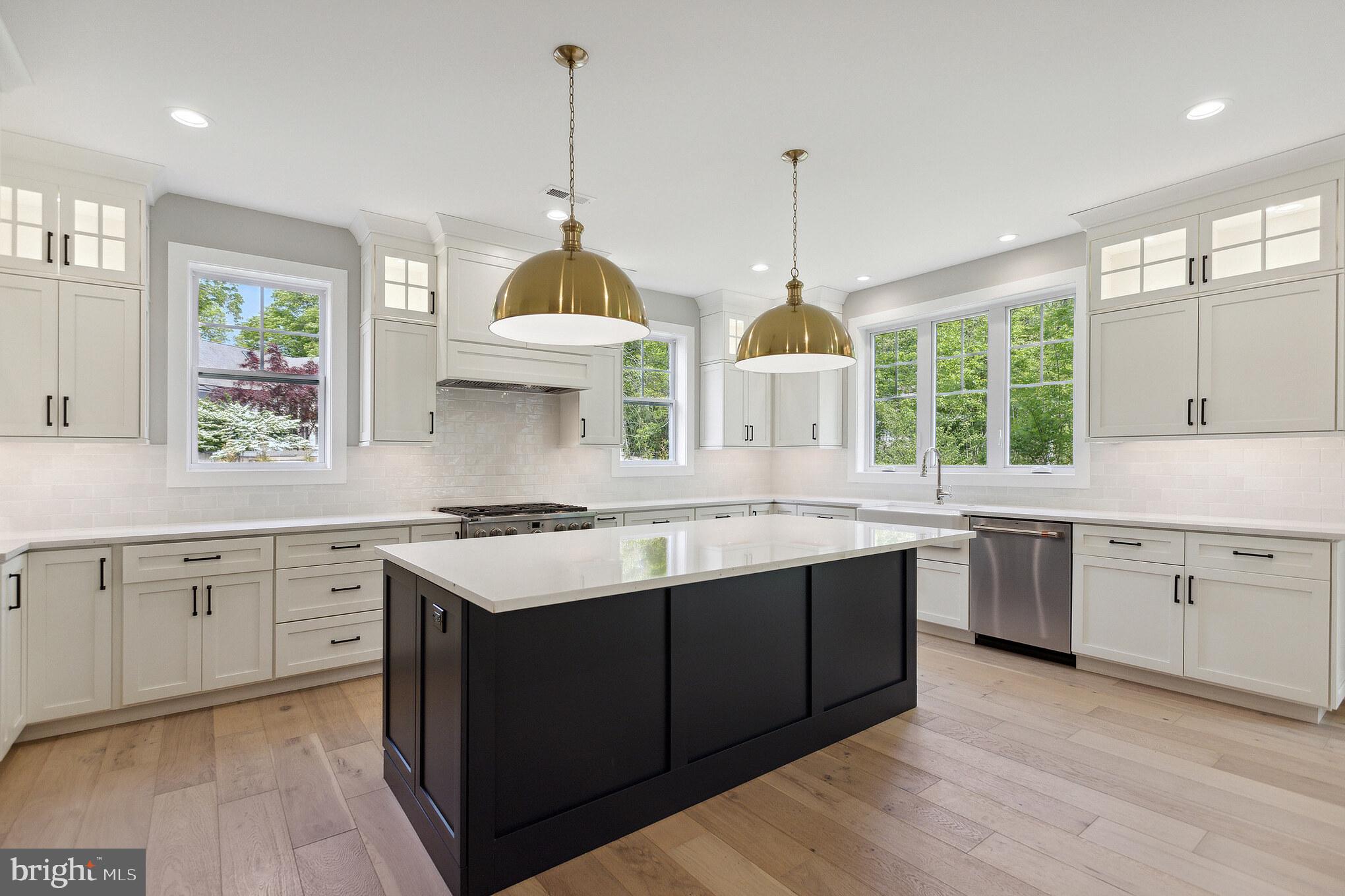1 Beech Hollow Road Lower Gwynedd, PA 19002 - Photo 11 of 17 a kitchen with a stove sink and window