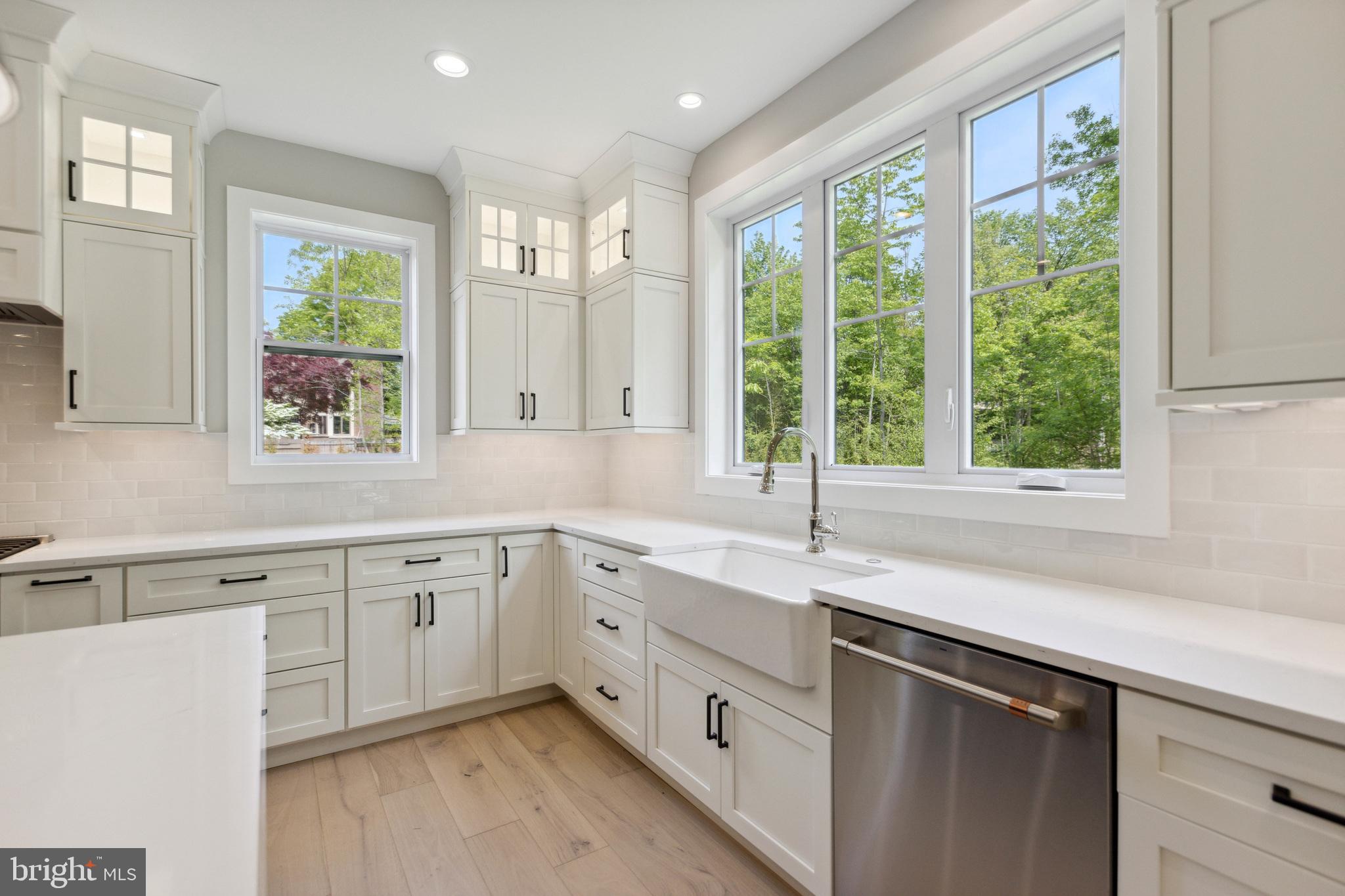 1 Beech Hollow Road Lower Gwynedd, PA 19002 - Photo 12 of 17 a kitchen with a sink window and cabinets