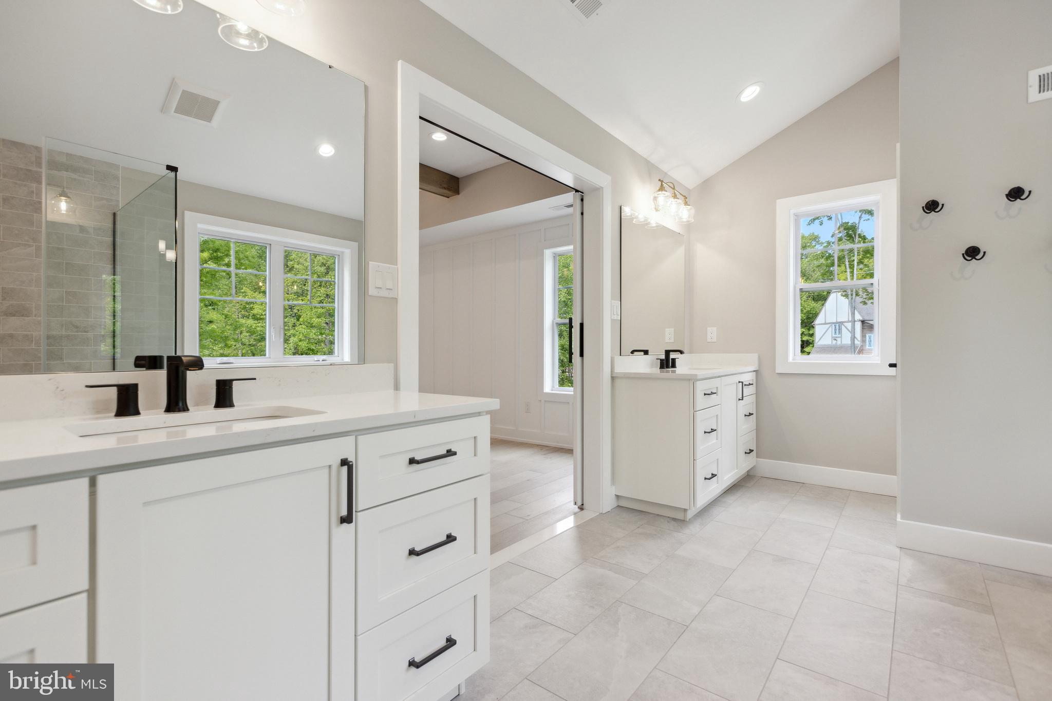 1 Beech Hollow Road Lower Gwynedd, PA 19002 - Photo 17 of 17 a bathroom with a granite countertop sink mirror and window