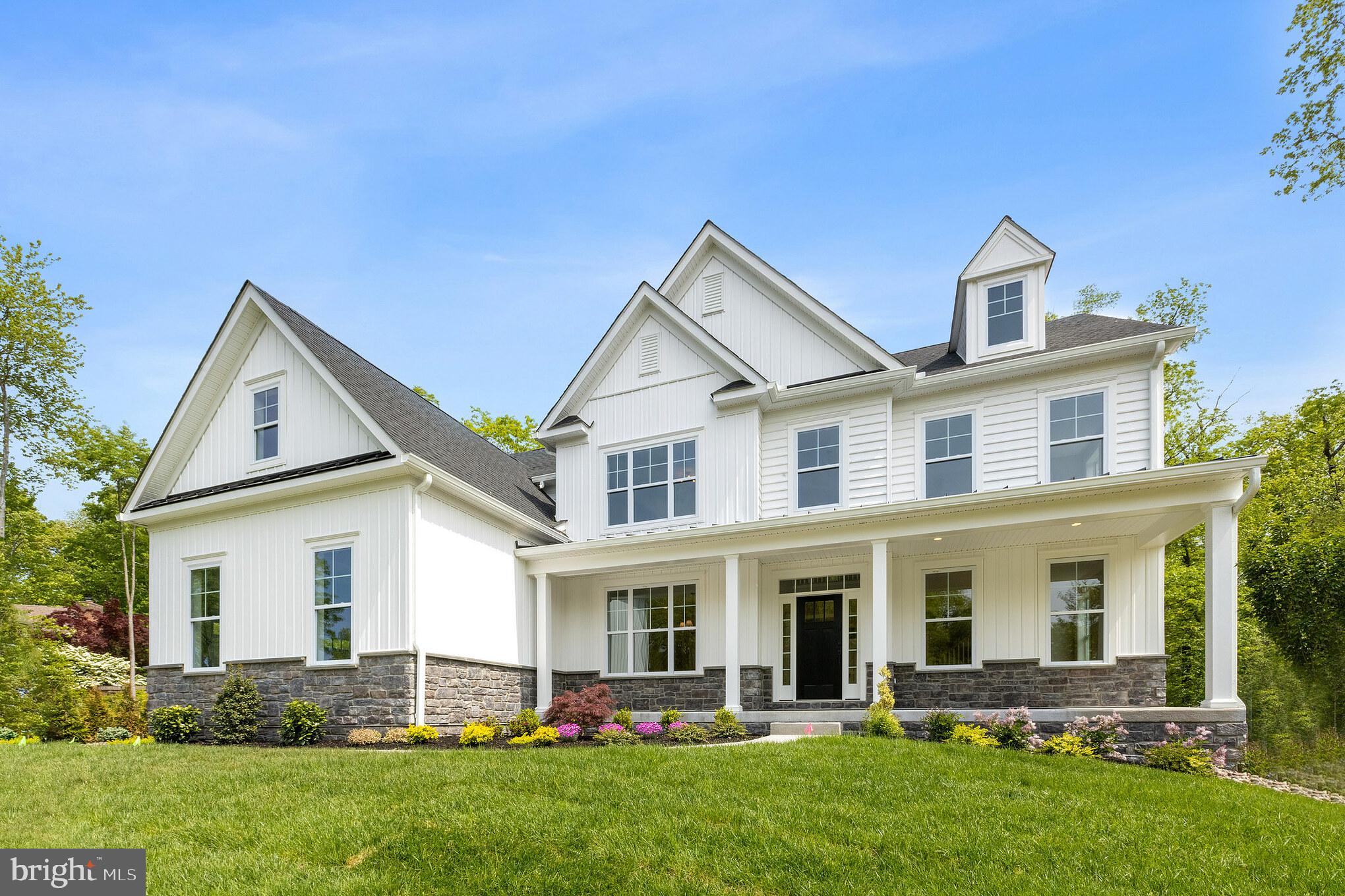 1 Beech Hollow Road Lower Gwynedd, PA 19002 - Photo 4 of 17 a front view of house with yard and green space